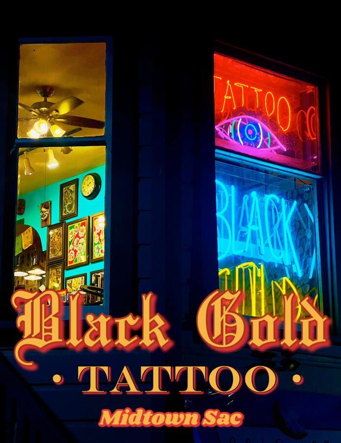 Black Gold Tattoo at night — Midtown Sacramento tattoo studio exterior illuminated, showcasing the shop’s logo and welcoming atmosphere on J Street