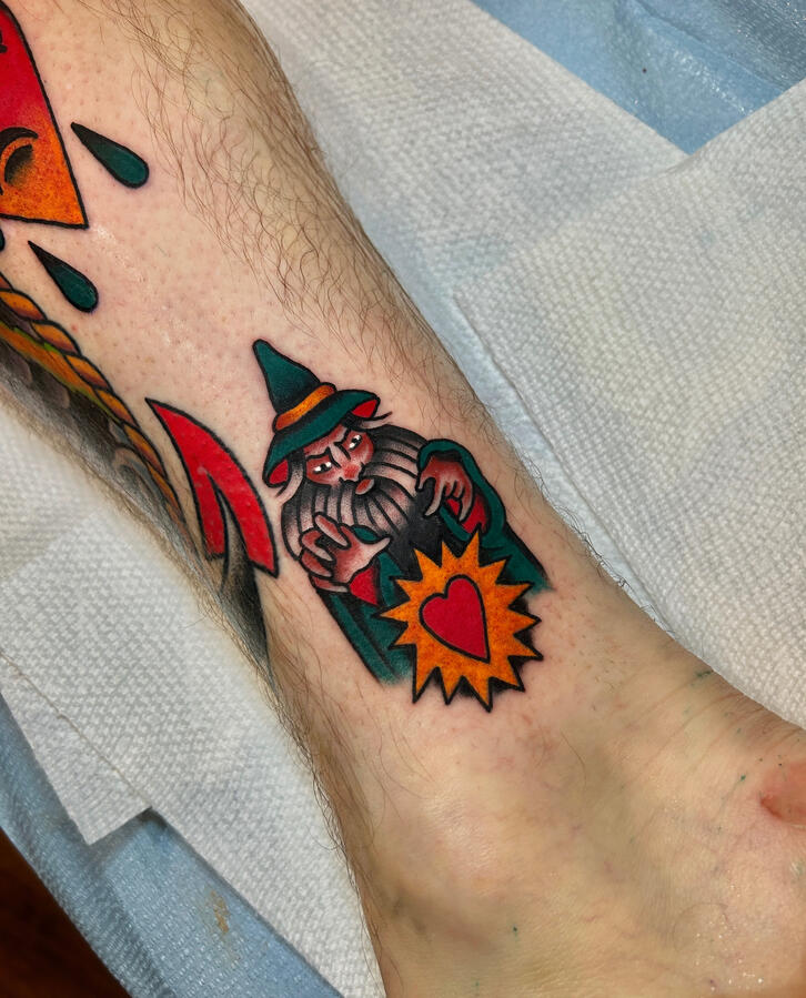 Detailed wizard tattoo with bold linework and clean shading done at Black Gold Tattoo in Midtown Sacramento.