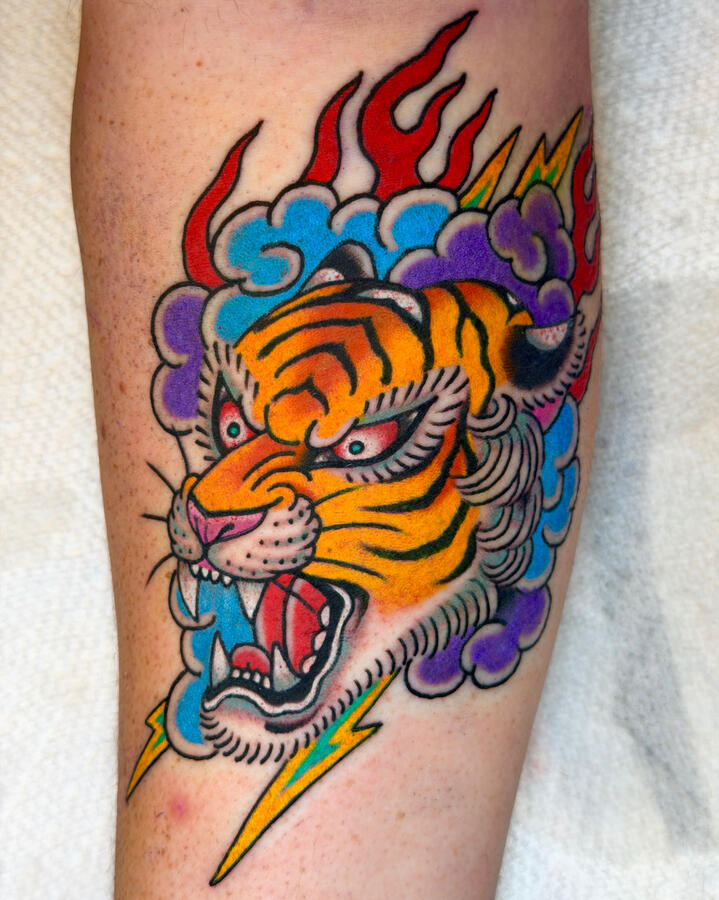 Bold traditional tiger tattoo Bold and colorful traditional American tiger tattoo